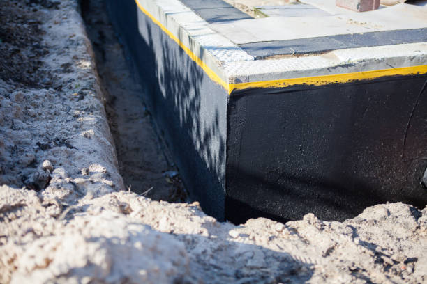 Professional Emergency Waterproofing technician working in Mendon, NY